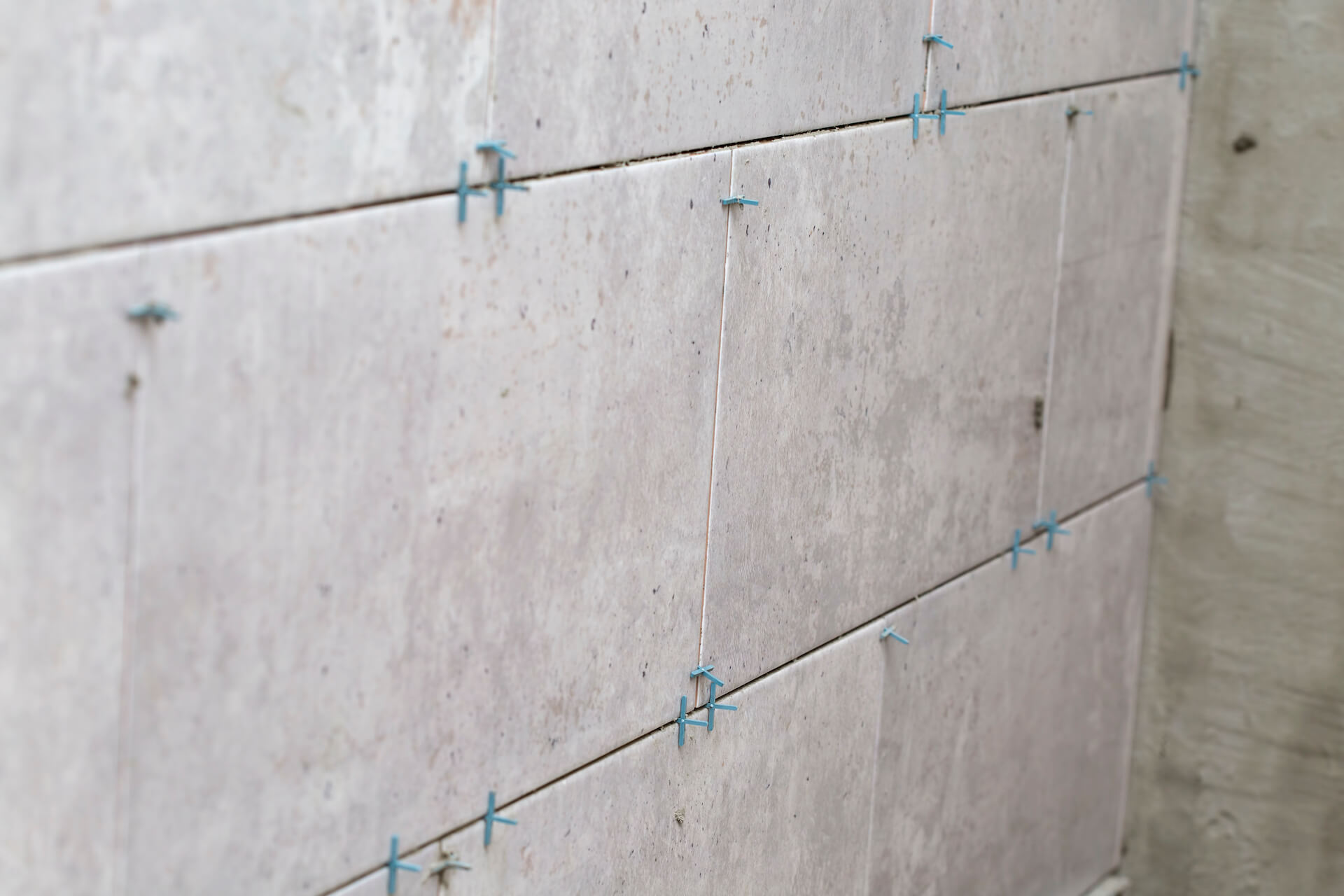 tiles-installation-with-spacers-between-ceramic-ti-2021-08-27-15-50-22-utc