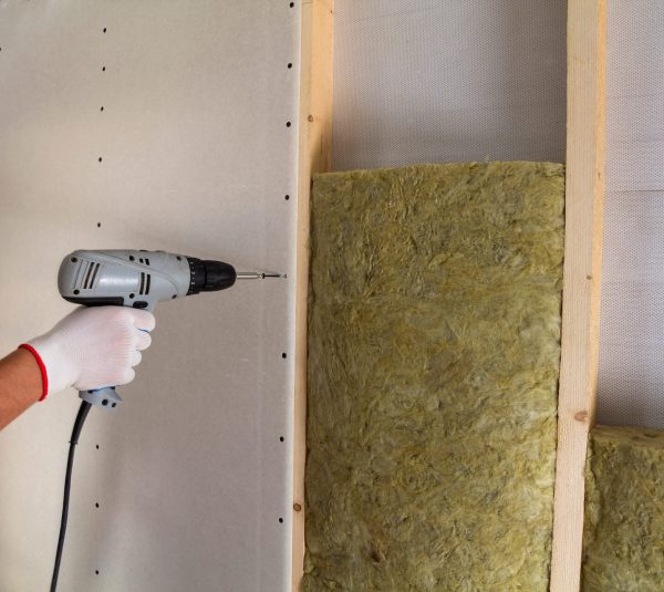 close-up-of-worker-hand-with-electric-screwdriver-2022-02-23-02-23-08-utc